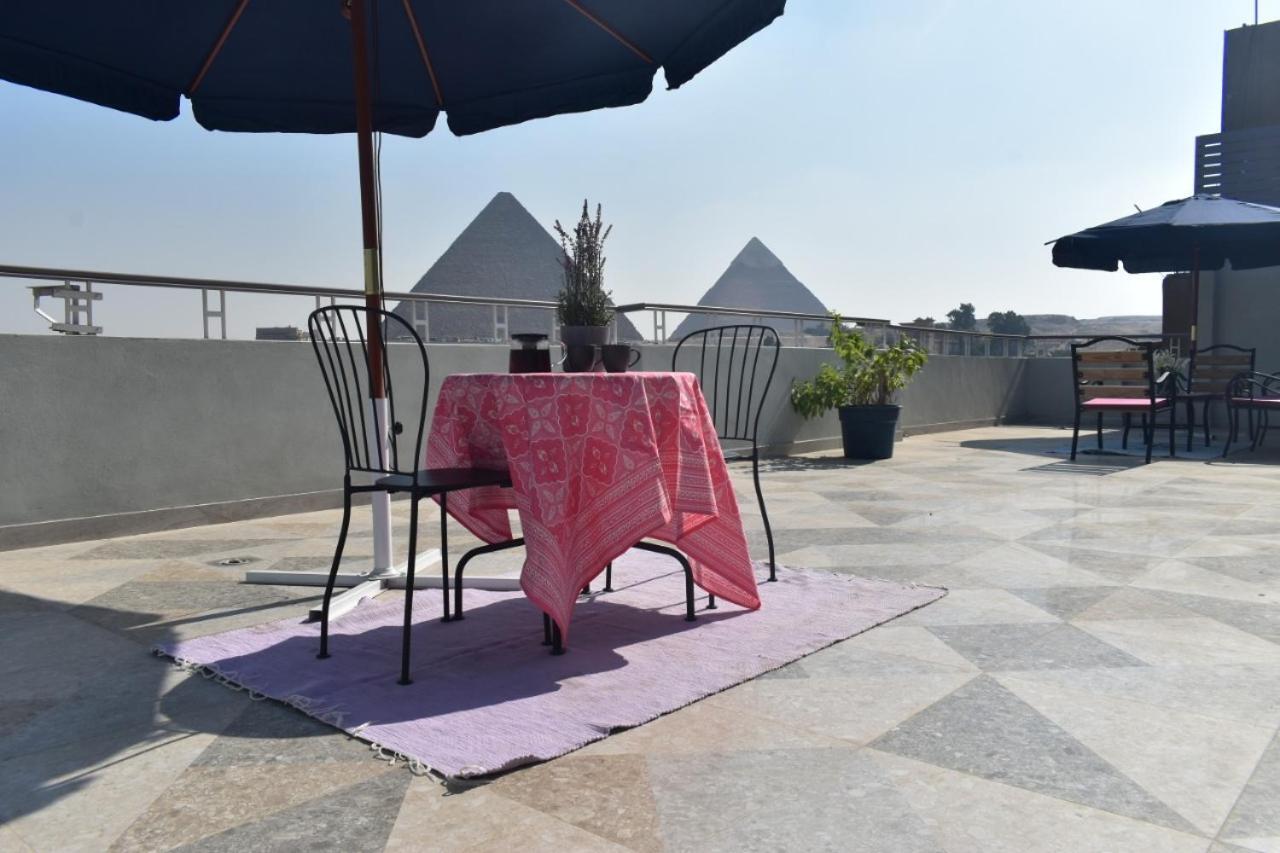 La Perle Pyramids Apartment ไคโร ภายนอก รูปภาพ